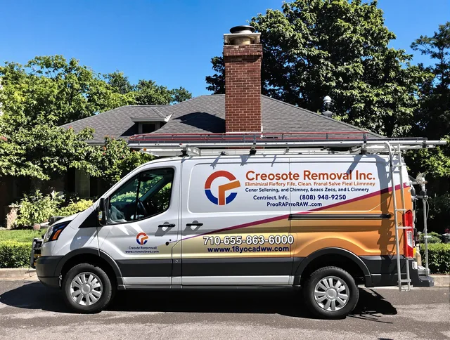 Avon Lake Chimney Sweep technician removing creosote safely in Avon Lake, OH