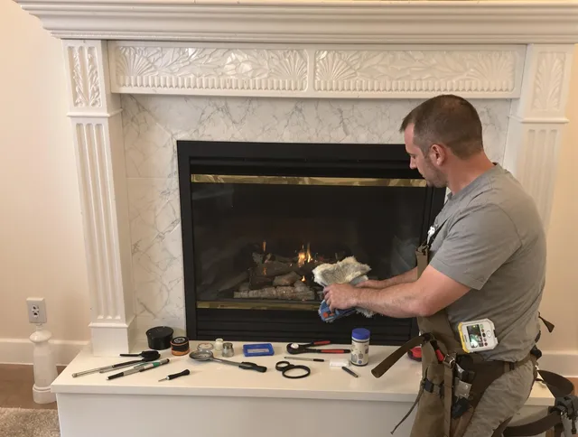 Avon Lake Chimney Sweep performing fireplace maintenance in Avon Lake, OH